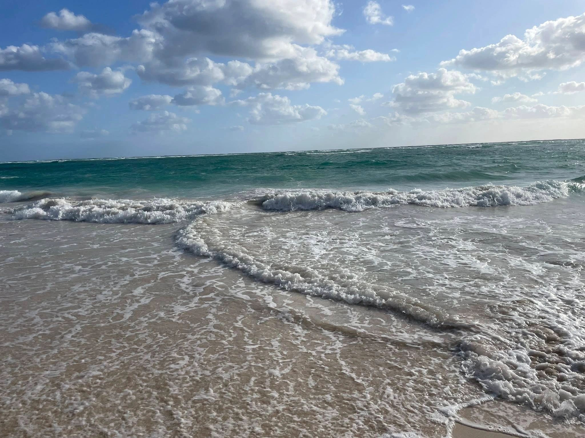 Bavaro Beach waves at Bahia Principe Luxury Esmeralda
